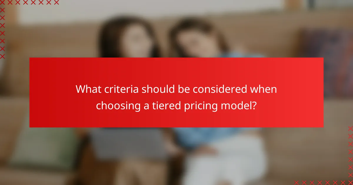 What criteria should be considered when choosing a tiered pricing model?